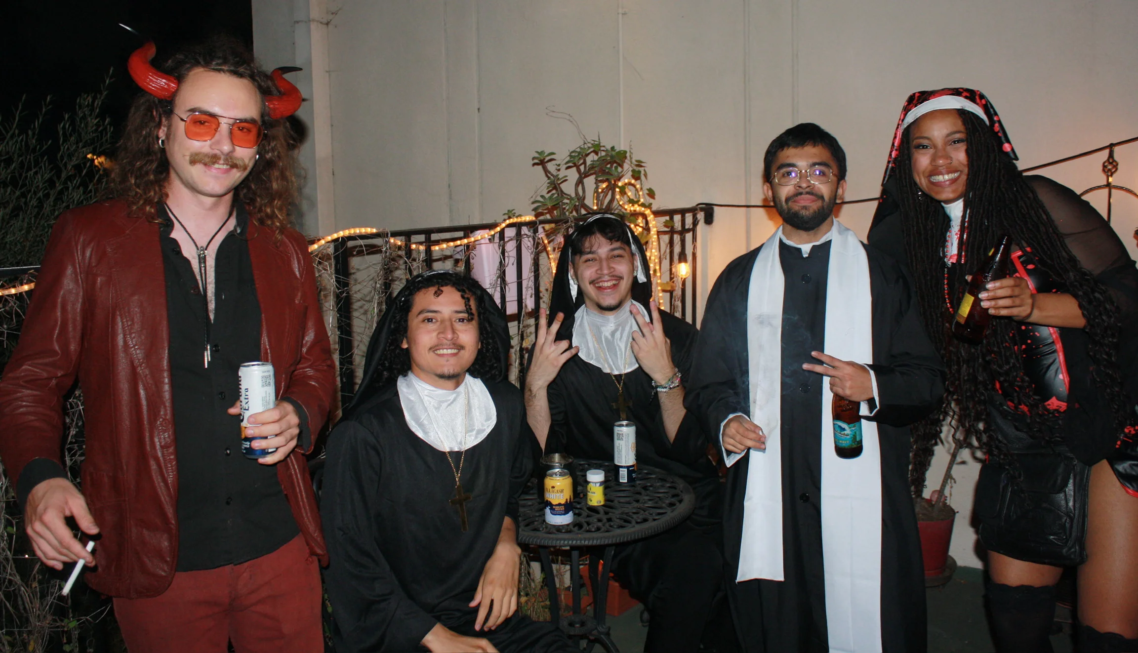 Friends together in costume at Halloween 2023